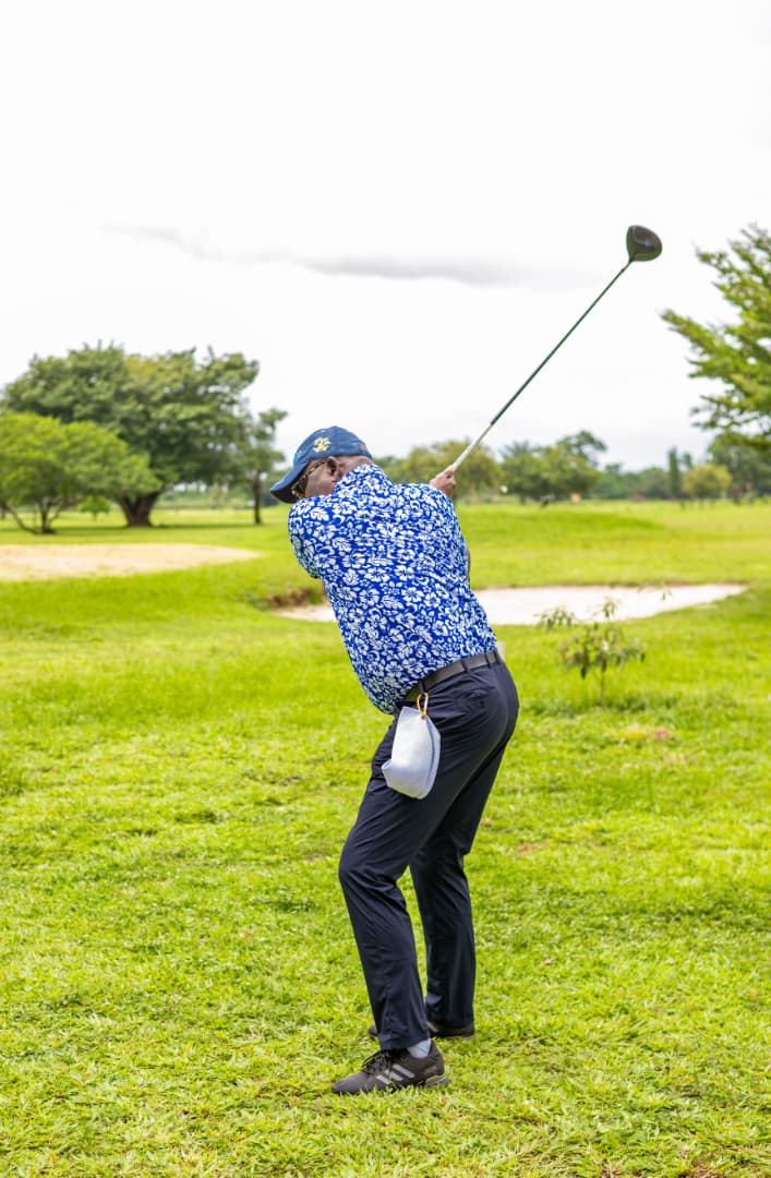 Member finishing a drive from the tee at Arsenal Golf & Country Club