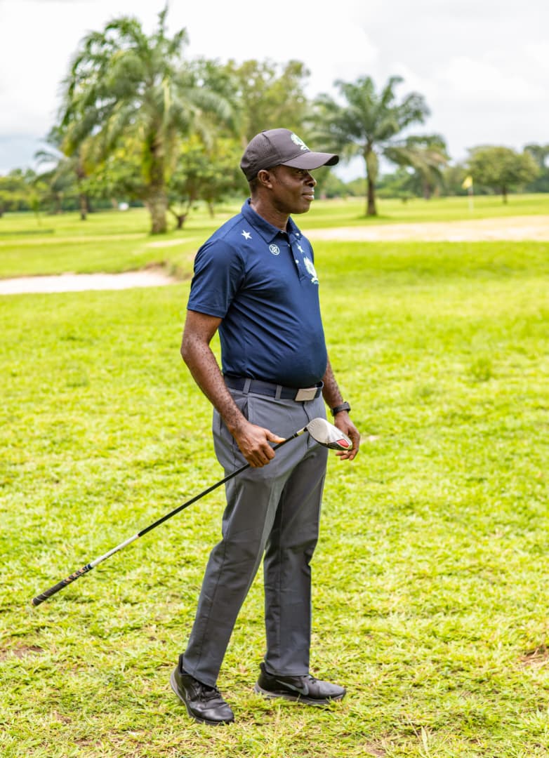 Golfer lining up his next shot on the open fairway