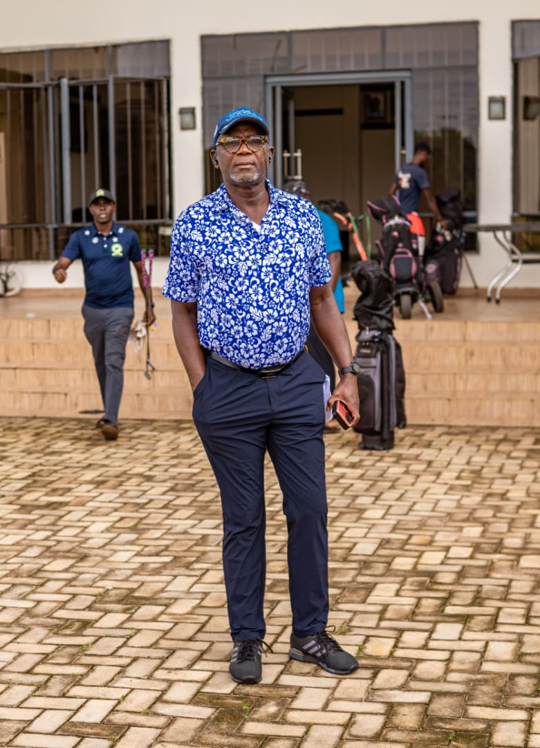 Member standing on the clubhouse forecourt before a round
